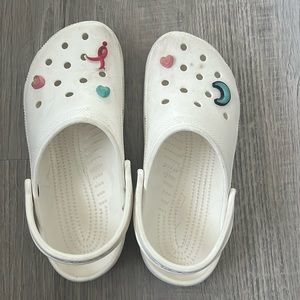 Size 10 women crocks.   Size 8 boys I guess.  See pic.   Barely worn.